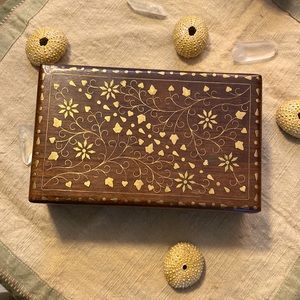 Wooden treasure box with brass inlay